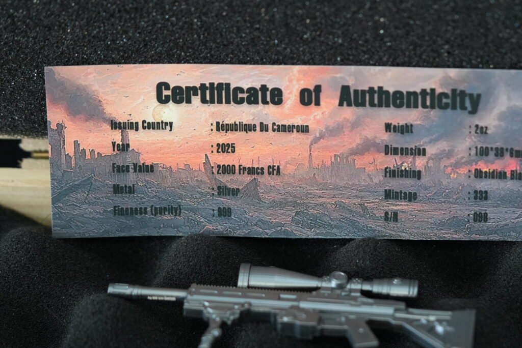2025 Cameroon Deadliest Weapons Ag 47 Widowmaker 2 oz Silver Mystery Box Coin
